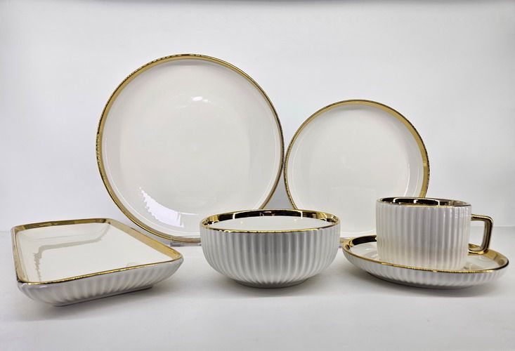 Electroplated ceramic tableware with metallic gold